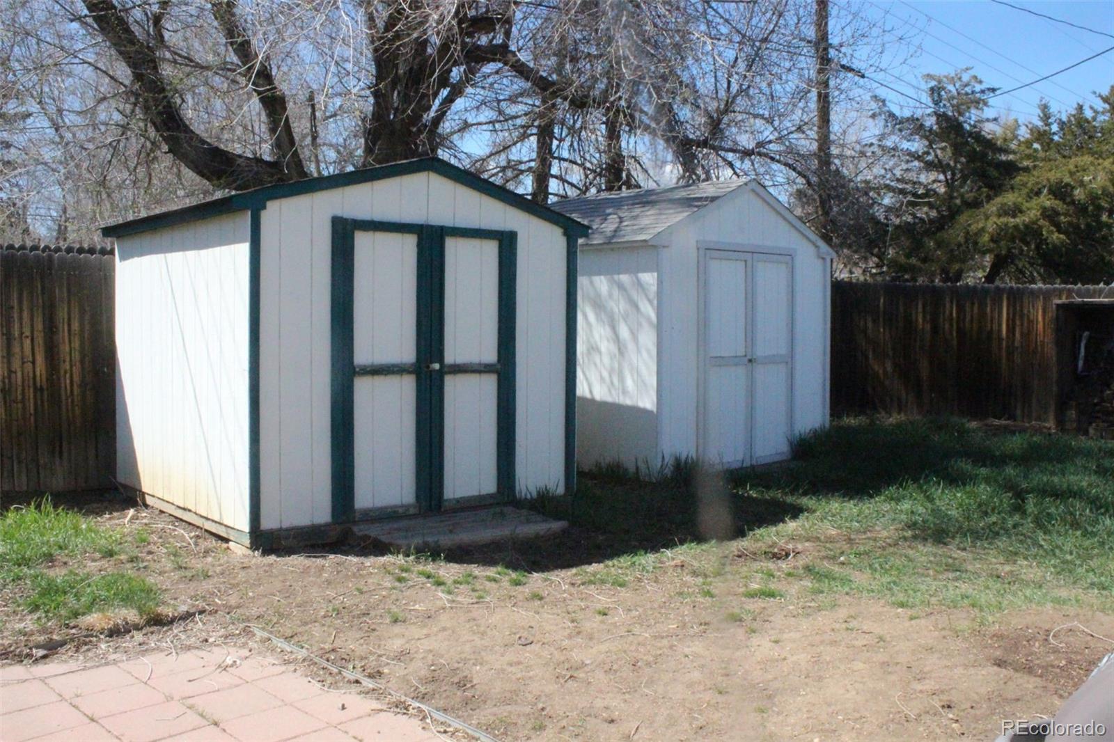 4935 Howell Street Golden, CO 80403 - Photo 17 of 34 a view of a house with a yard