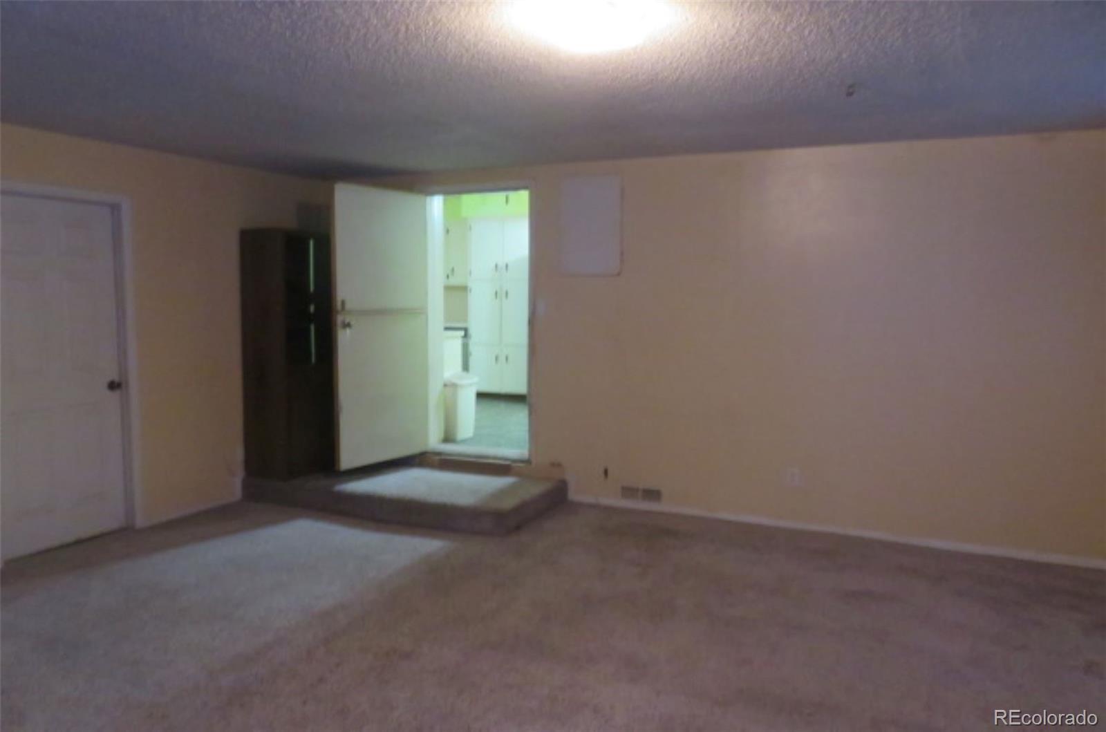 4935 Howell Street Golden, CO 80403 - Photo 23 of 34 an empty room with closet