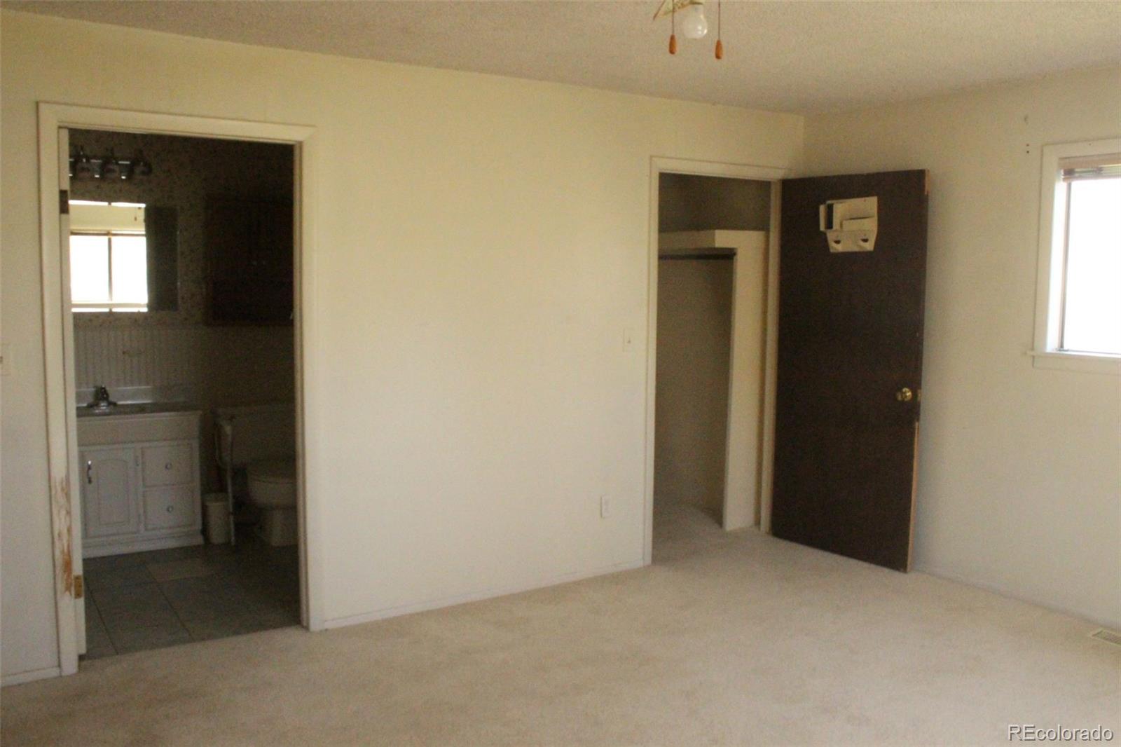 4935 Howell Street Golden, CO 80403 - Photo 30 of 34 a view of an empty room and window