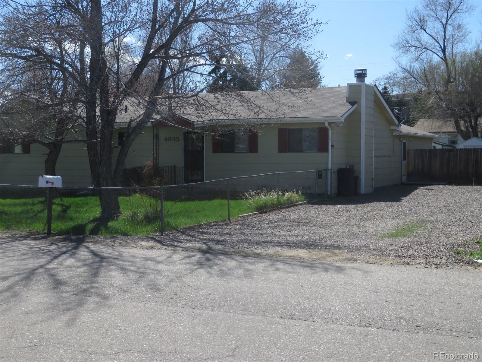 4935 Howell Street Golden, CO 80403 - Photo 34 of 34 a front view of a house with garden