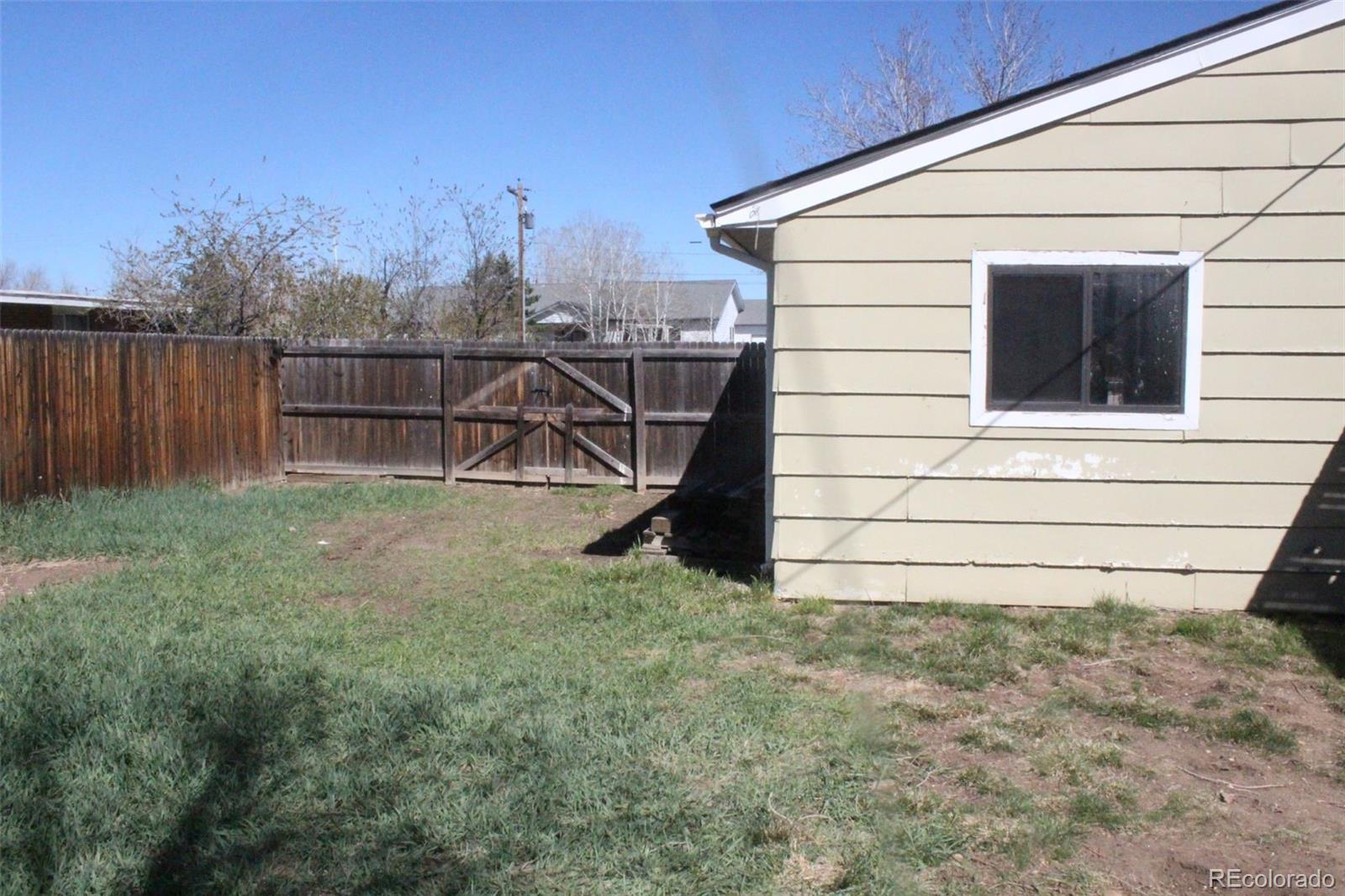 4935 Howell Street Golden, CO 80403 - Photo 9 of 34 a view of backyard with cabin