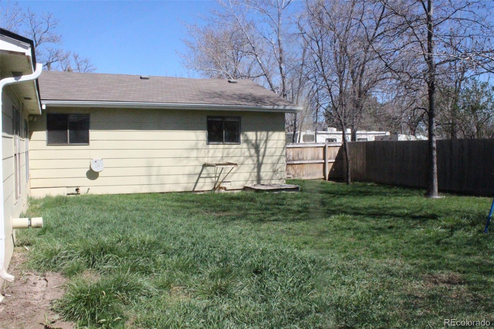 4935 Howell Street Golden, CO 80403 - Photo 10 of 34 a view of a house with a yard