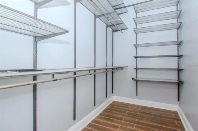 a view of a room with racks on the wall