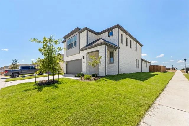 a front view of house with yard