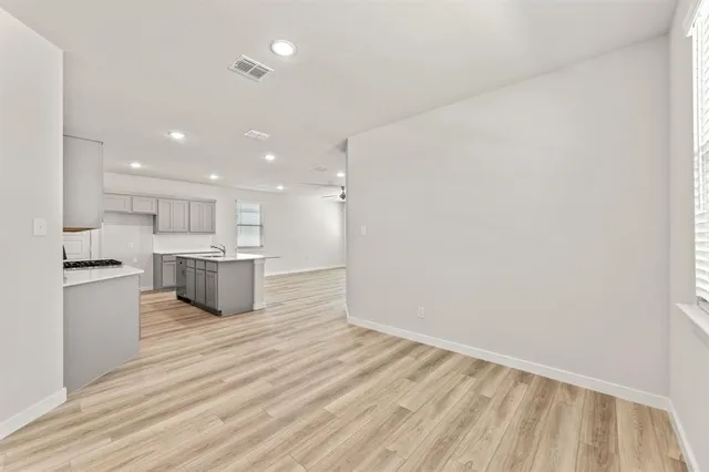 a view of kitchen with wooden floor