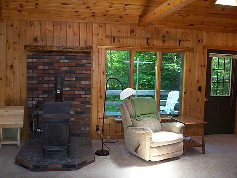 613 Brighton Road Solon, ME 04979 - Photo 6 of 35 Living Room. Wood stove