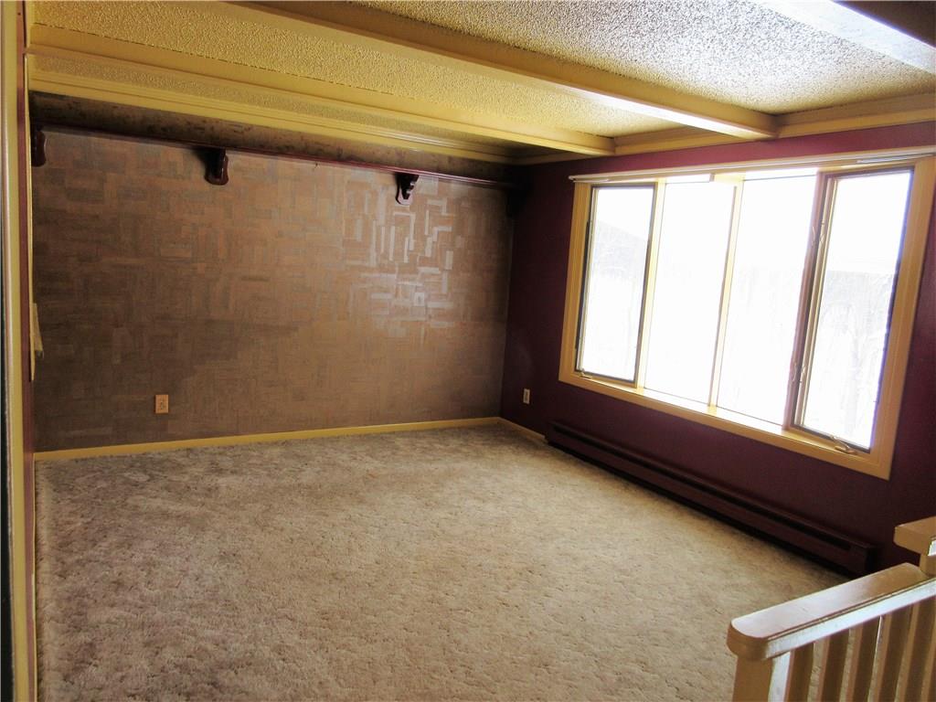 3598 Hadley Road Clarks Mills, PA 16114 - Photo 6 of 25 The living room is brightly lit with a large bay window!