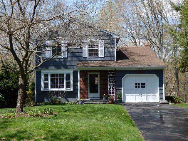 57 Old Sawmill Road Trumbull, CT 06611 - Photo 1 of 1 front view of a house with a garden