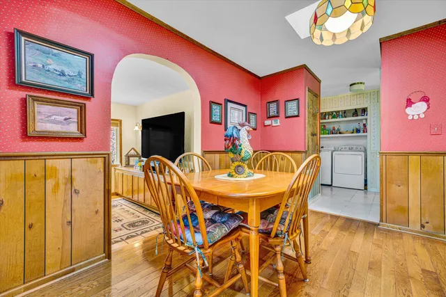 a spacious bedroom with a bed and a couch