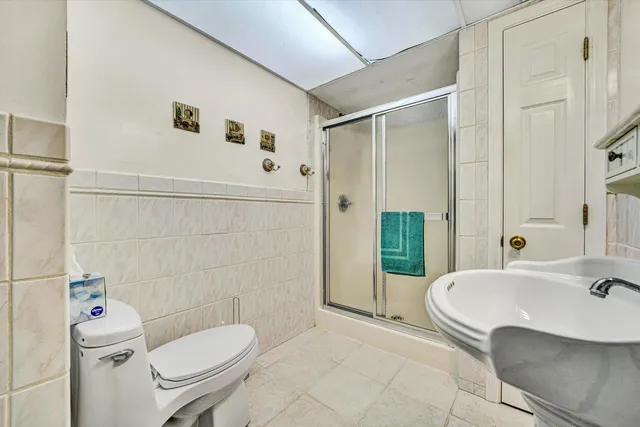 a aerial view of a house with a yard