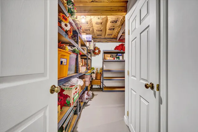 a view of a city with lush green forest