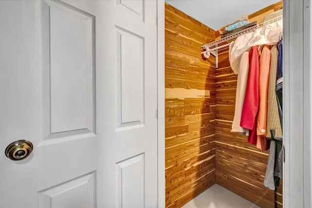 a view of a lush green hillside and houses