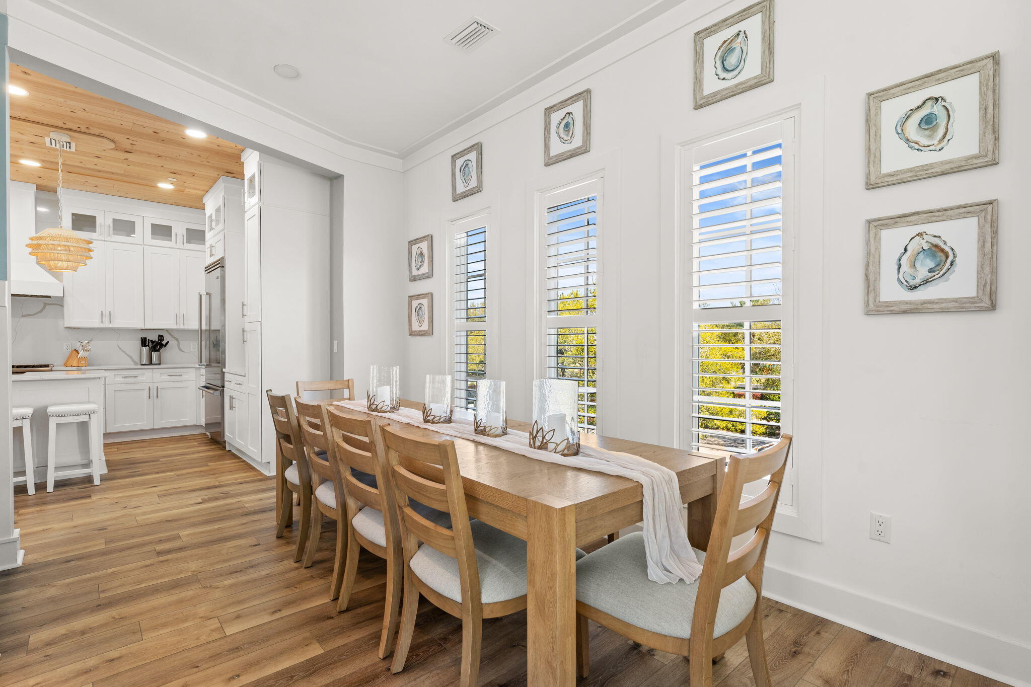 413 Henderson Cottage Way Destin, FL 32541 - Photo 12 of 48 a view of a dining room with furniture and window