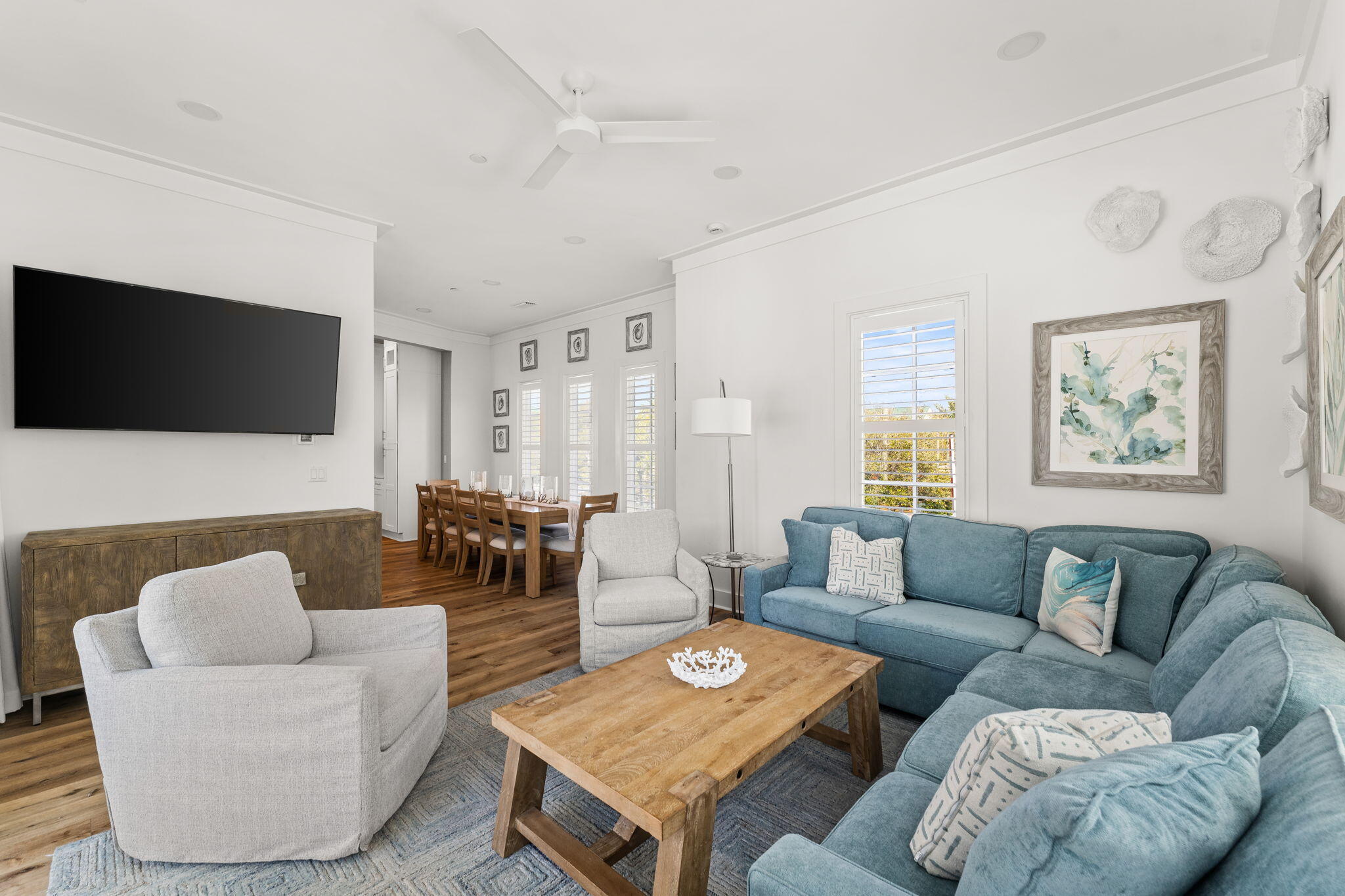 413 Henderson Cottage Way Destin, FL 32541 - Photo 15 of 48 a living room with furniture and a flat screen tv