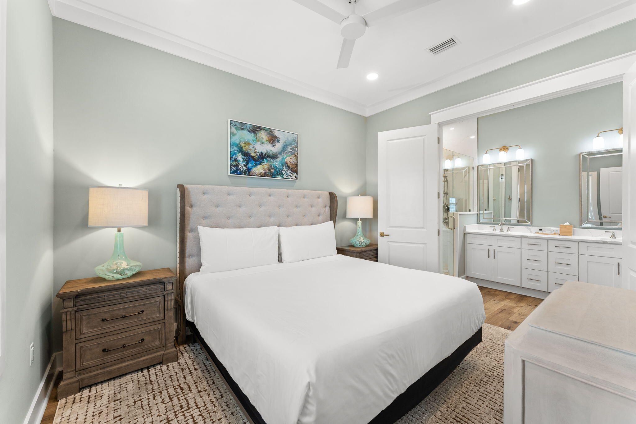 413 Henderson Cottage Way Destin, FL 32541 - Photo 23 of 48 a bedroom with a bed and a view of closet