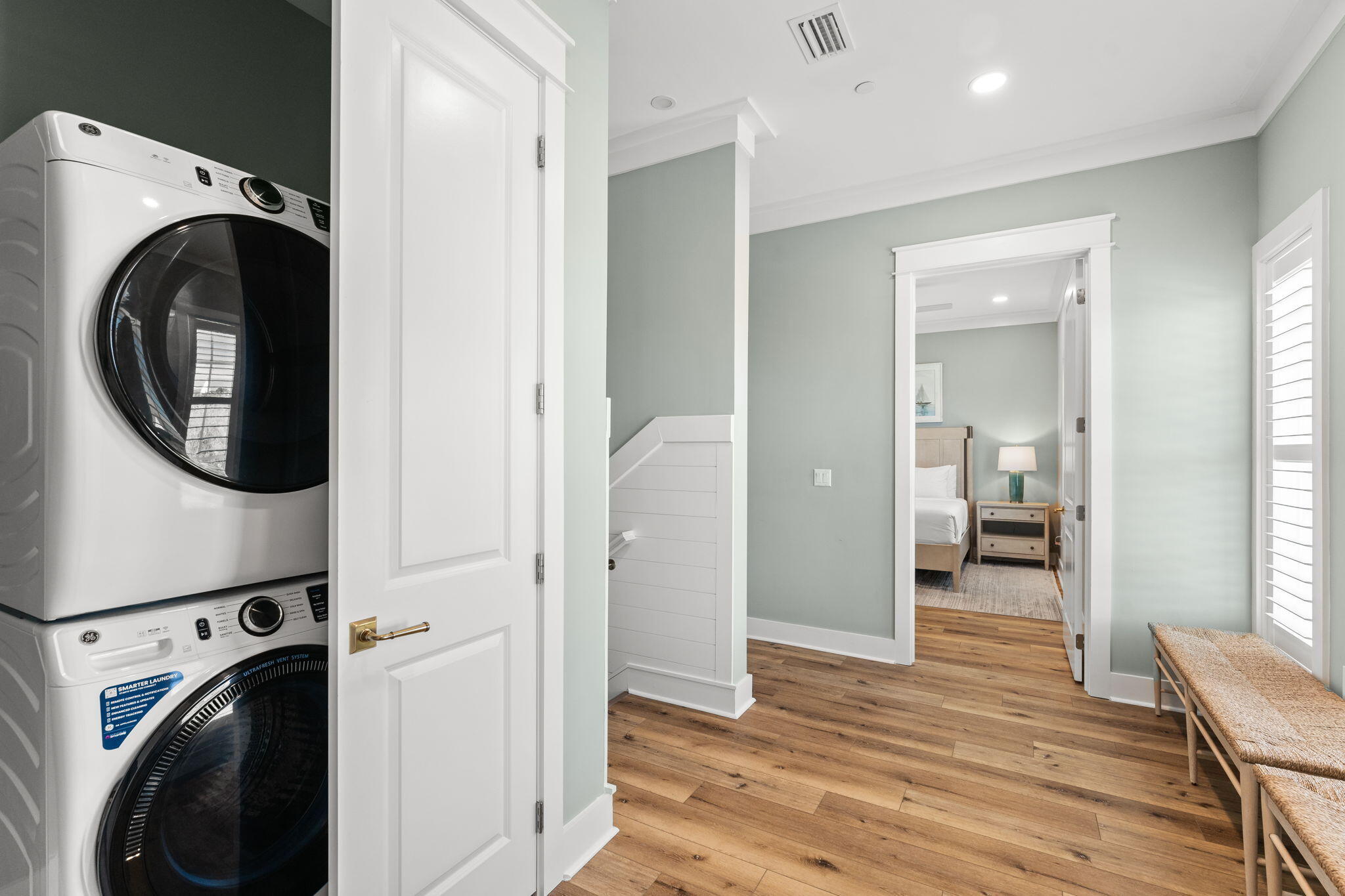 413 Henderson Cottage Way Destin, FL 32541 - Photo 27 of 48 a view of a hallway with washer and dryer