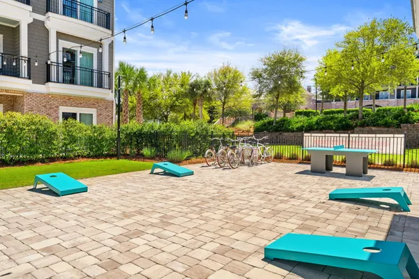 a view of patio with swimming pool and outdoor seating