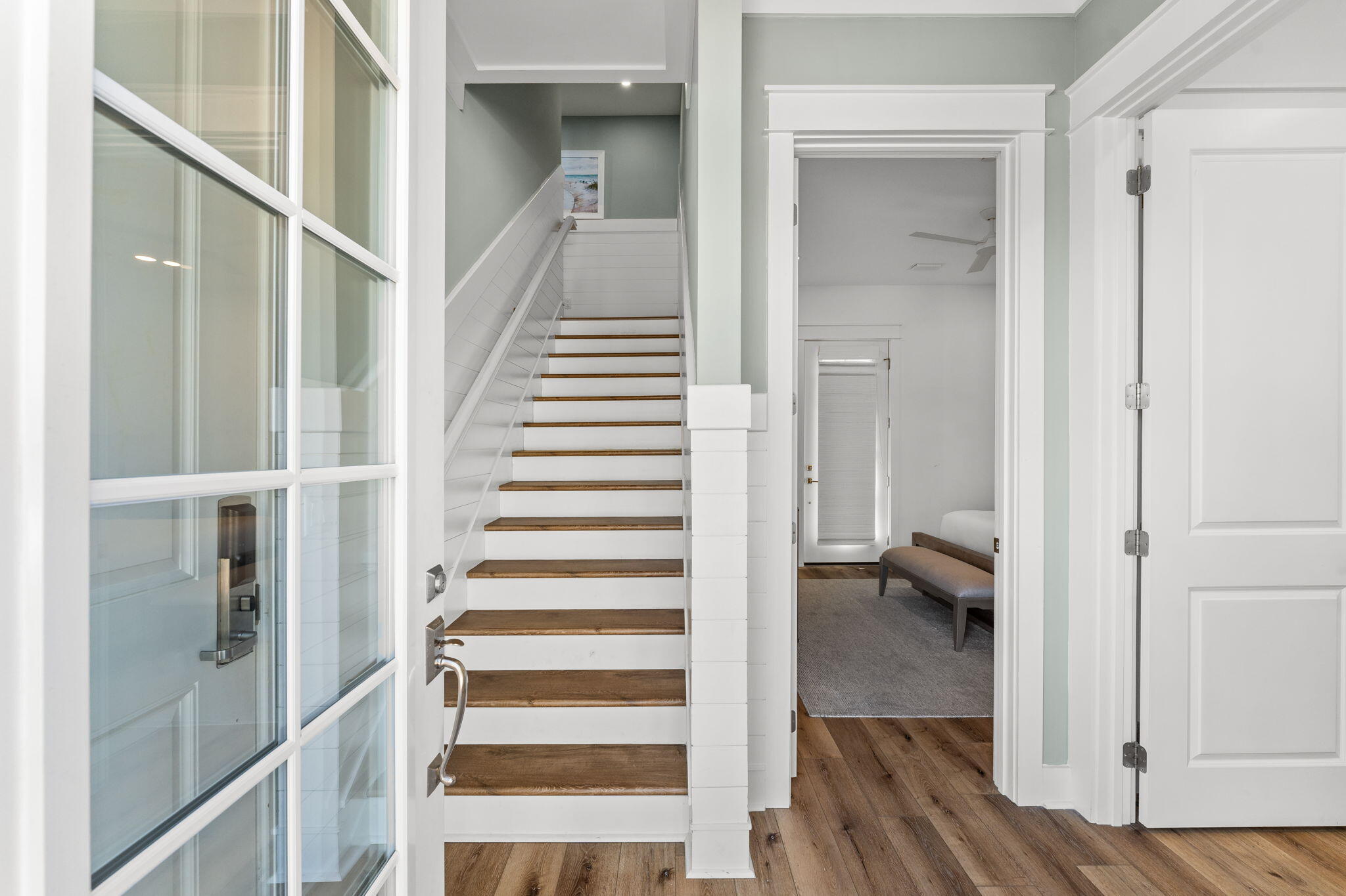 413 Henderson Cottage Way Destin, FL 32541 - Photo 4 of 48 a view of a hallway with wooden floor and entryway