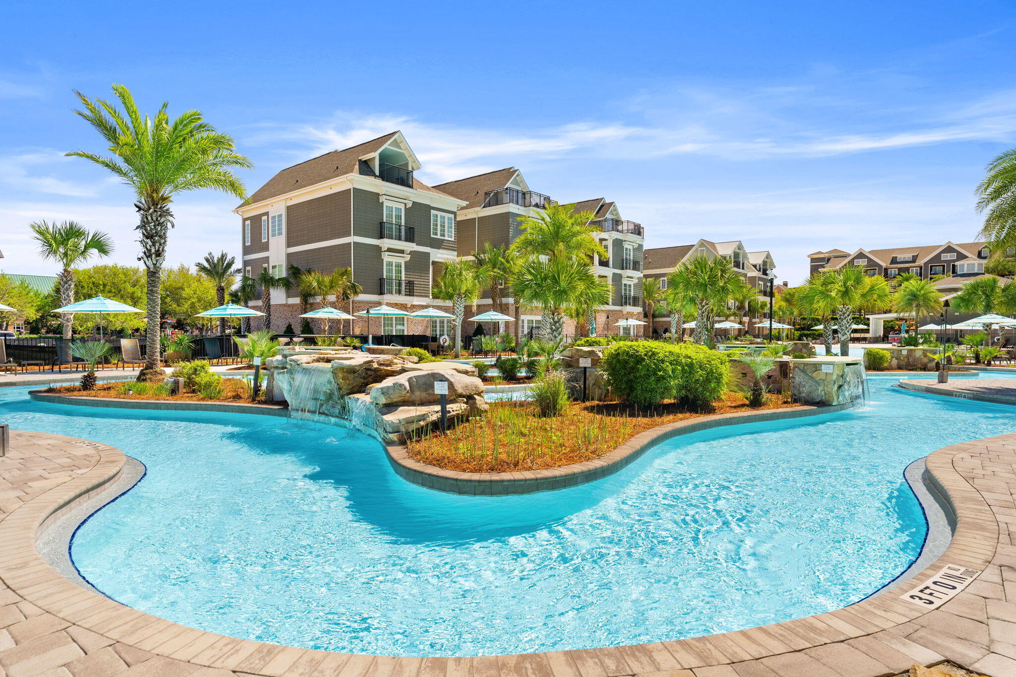 413 Henderson Cottage Way Destin, FL 32541 - Photo 41 of 48 a view of a swimming pool with a table and chairs