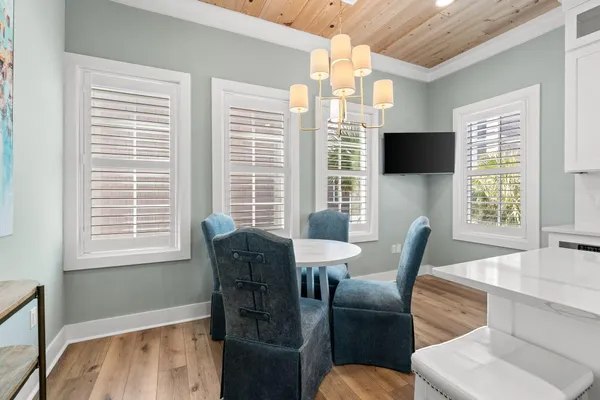 a view of a livingroom with furniture and a window