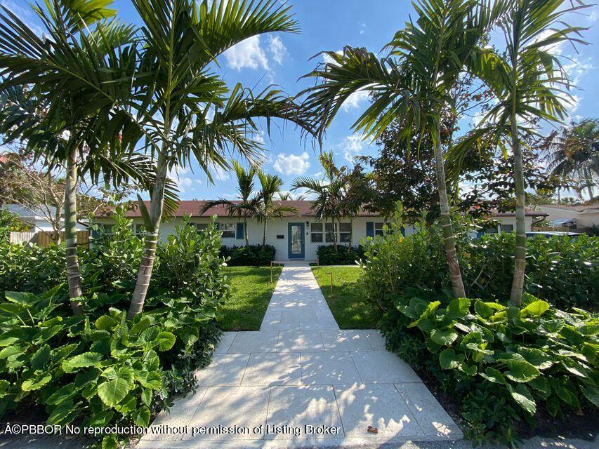 222 Pilgrim Road West Palm Beach, FL 33405 - Photo 1 of 12 a view of a pathway with plants