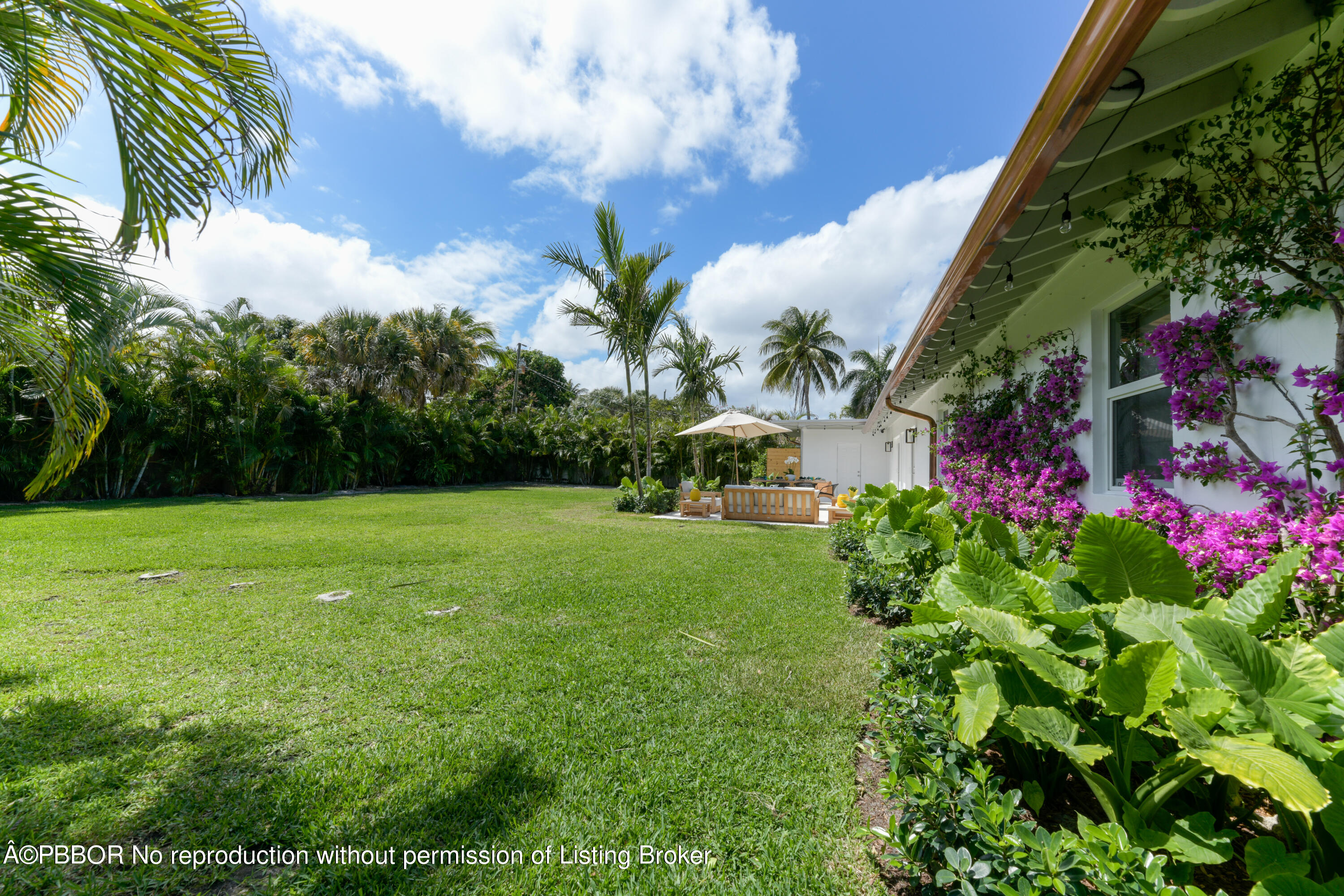 222 Pilgrim Road West Palm Beach, FL 33405 - Photo 12 of 12 a front view of a house with garden