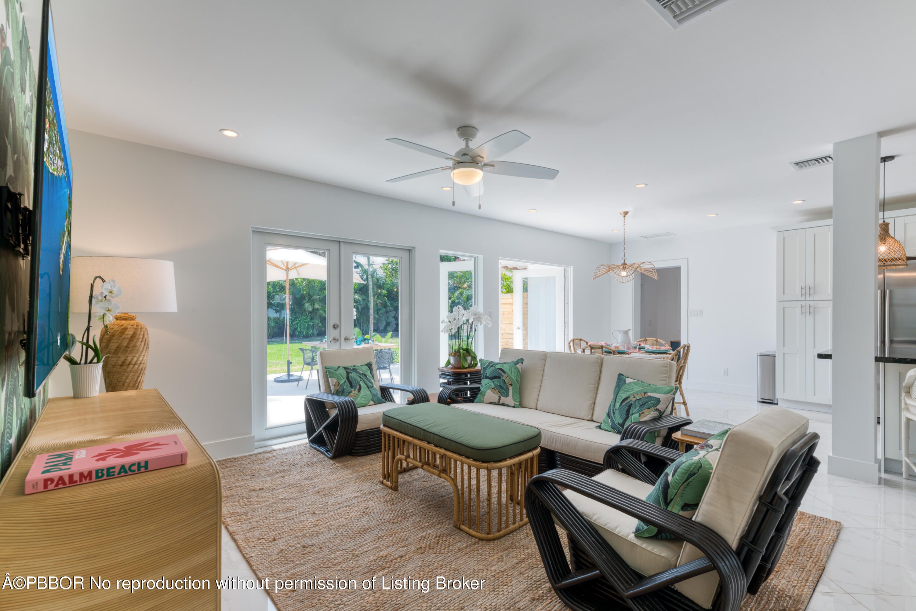 222 Pilgrim Road West Palm Beach, FL 33405 - Photo 3 of 12 a living room with furniture and a large window