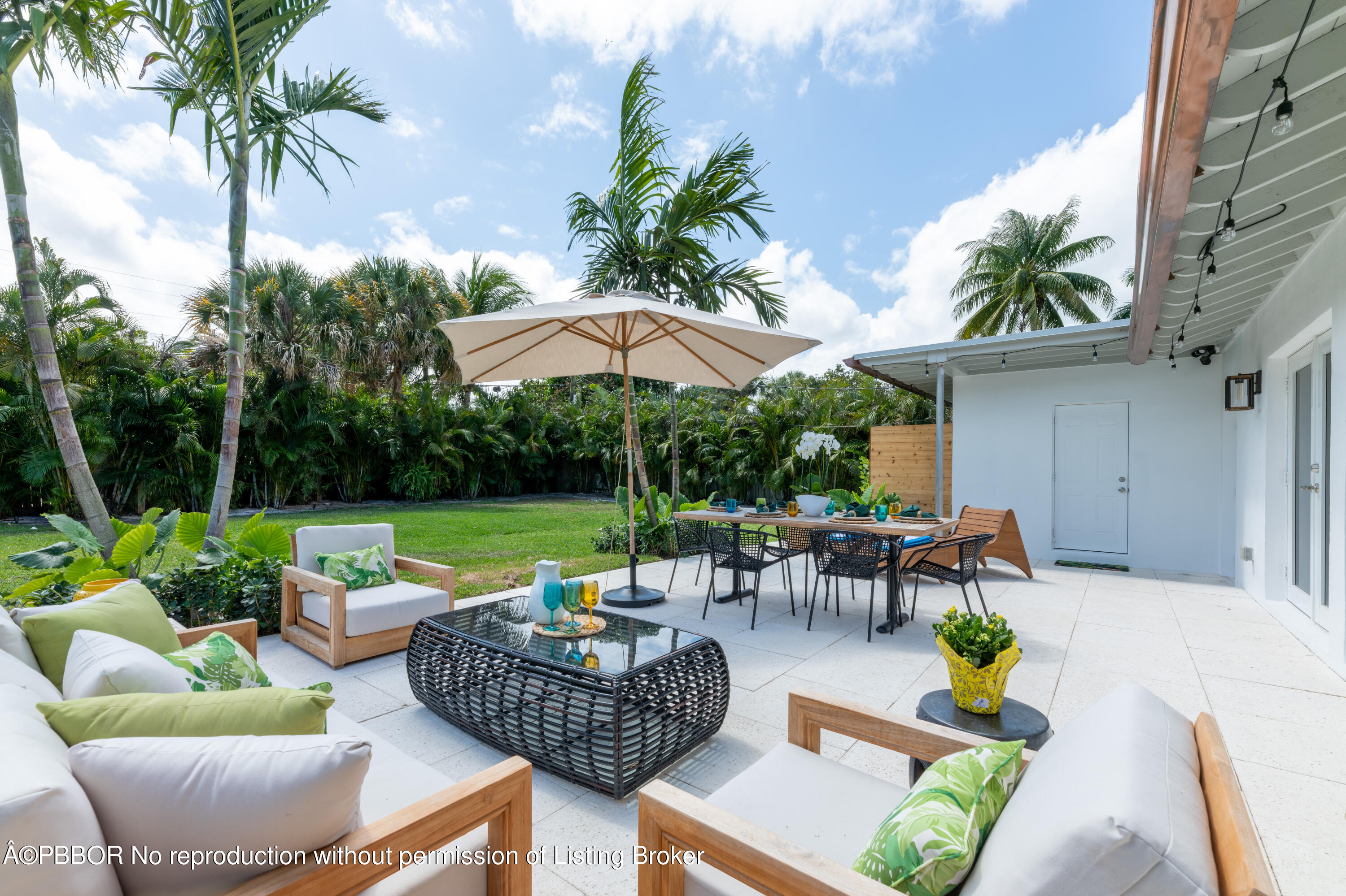 222 Pilgrim Road West Palm Beach, FL 33405 - Photo 10 of 12 a view of an outdoor sitting area with furniture and garden