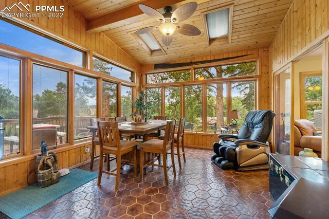 a living room with rug toys and a rug