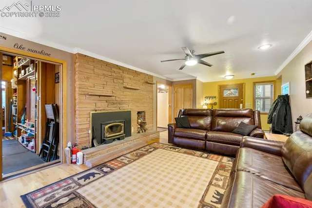 a kitchen with stainless steel appliances granite countertop a lot of counter space and wooden floors