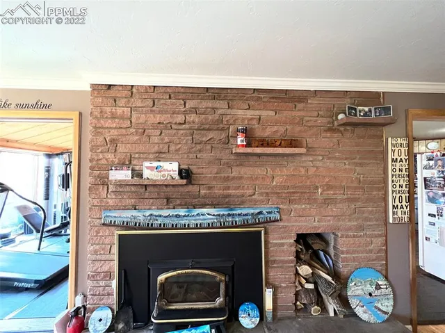 a living room with furniture ceiling fan and a rug