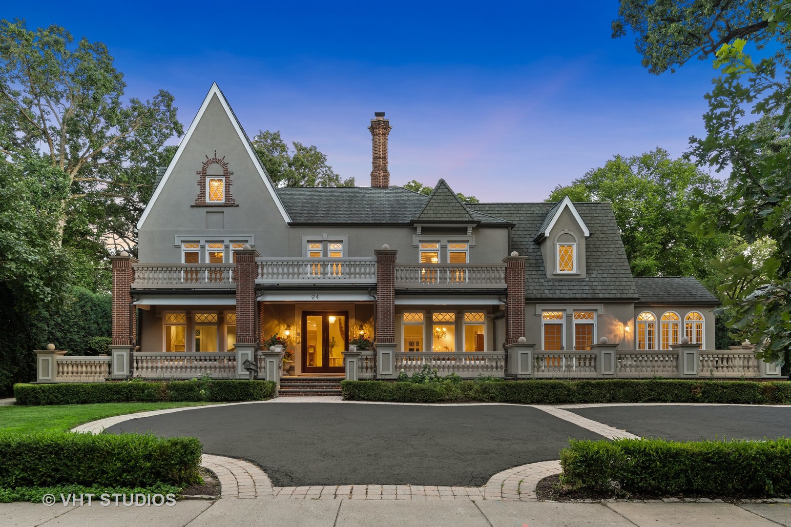 24 Warwick Road Winnetka, IL 60093 - Photo 2 of 8 a front view of a house with a yard