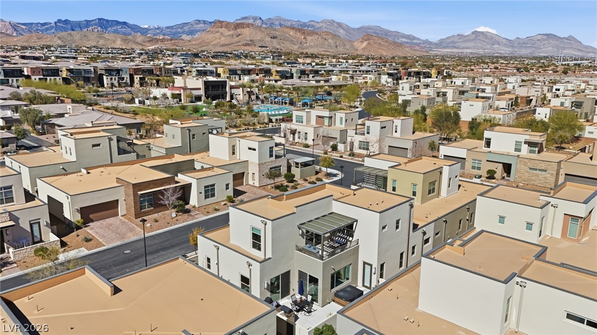4246 Swift Street Las Vegas, NV 89135 - Photo 54 of 71 Aerial perspective of suburban area with a mountainous background