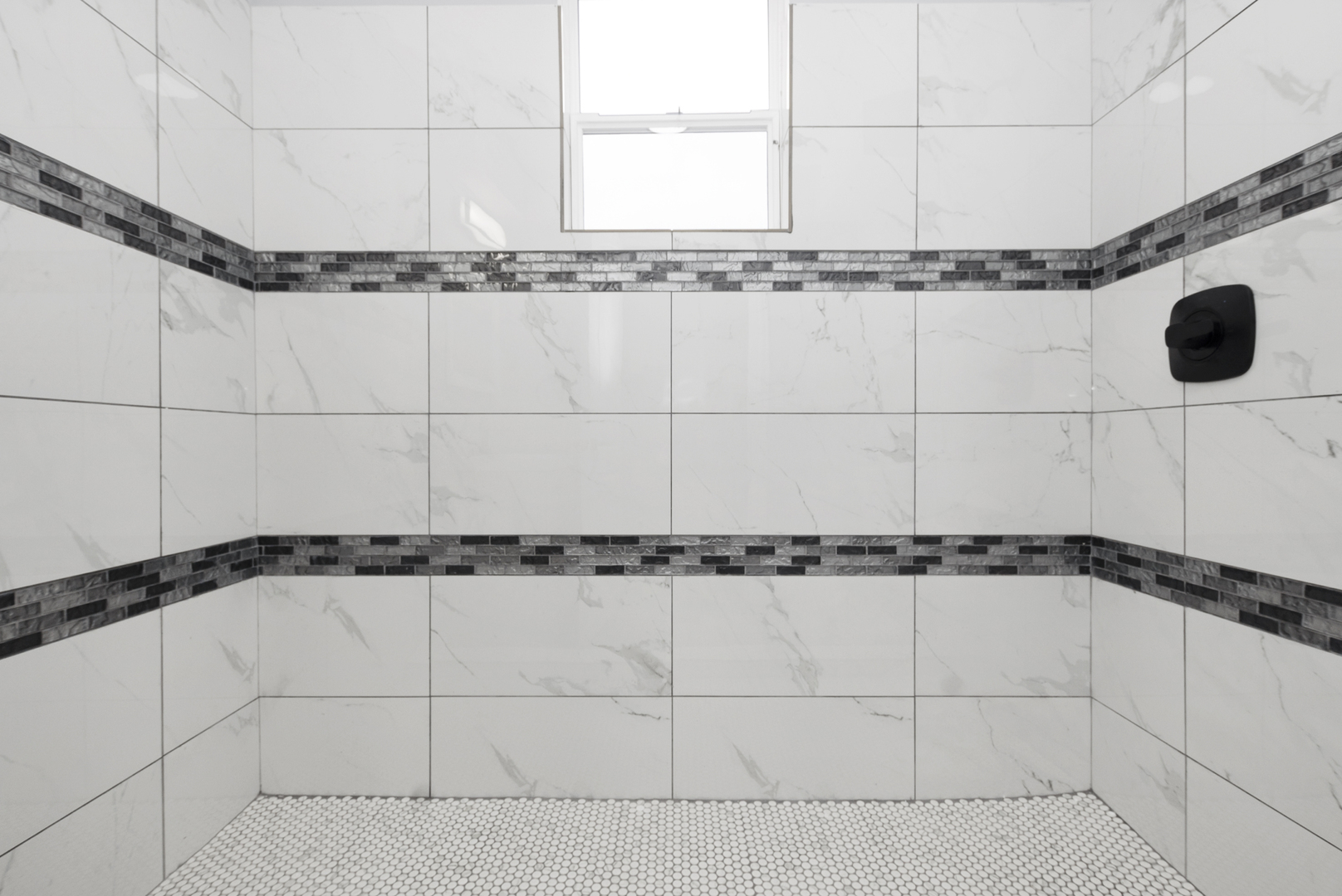 643 East 89th Street Chicago, IL 60619 - Photo 26 of 28 a bathroom with a window and a shower