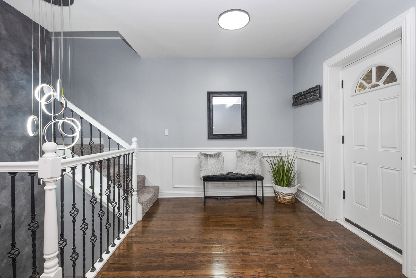 643 East 89th Street Chicago, IL 60619 - Photo 3 of 28 a view of entryway and hall with wooden floor