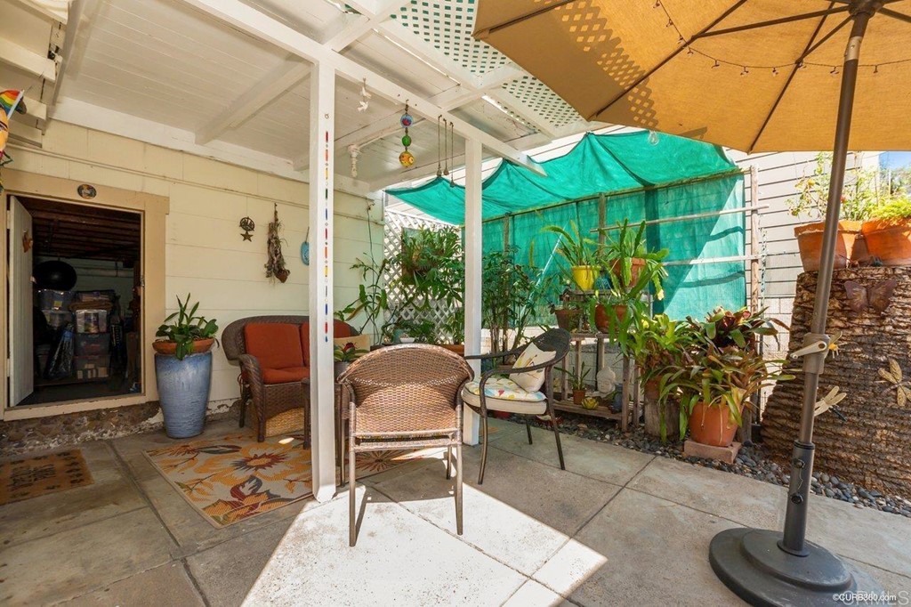 3023-3027 Olive Street San Diego, CA 92104 - Photo 16 of 41 Access to 1 car garage and separate storage room (seen through door opening)