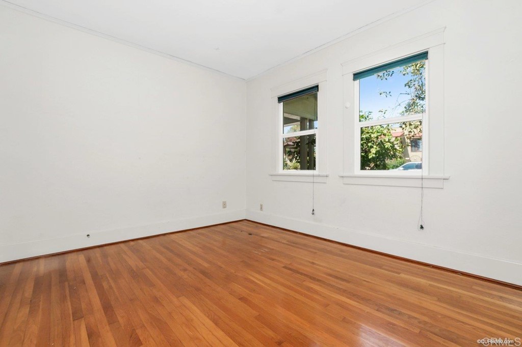 3023-3027 Olive Street San Diego, CA 92104 - Photo 35 of 41 Bedroom 2 facing Olive Street features windows on 2 walls