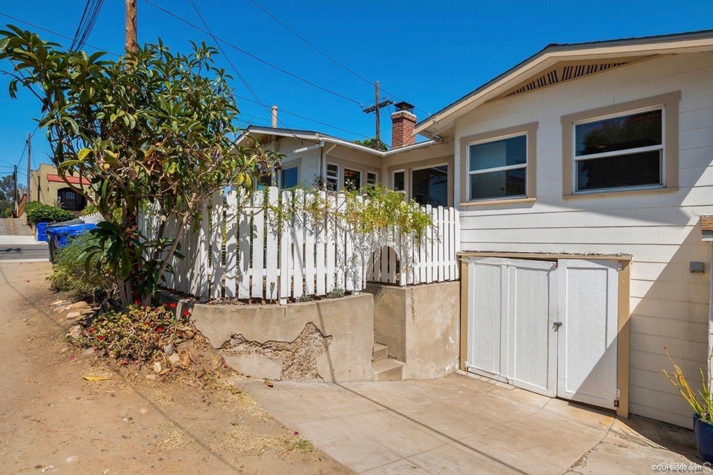 3023-3027 Olive Street San Diego, CA 92104 - Photo 40 of 41 Private 1 car garage under the home