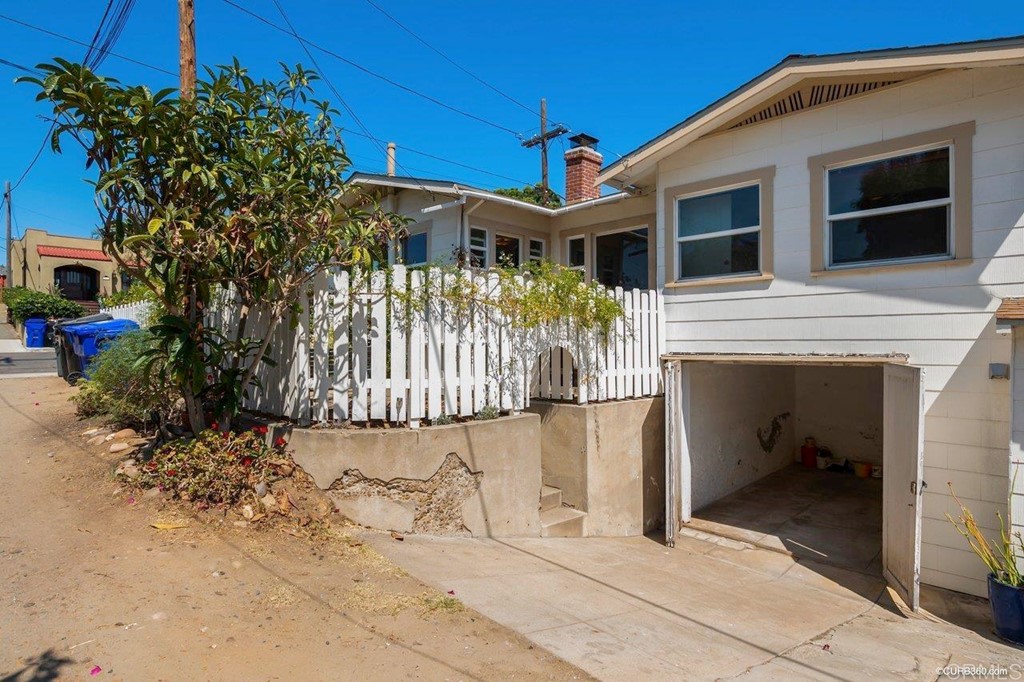 3023-3027 Olive Street San Diego, CA 92104 - Photo 41 of 41 Private 1 car garage under the home