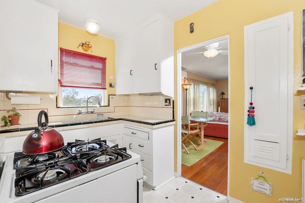 3023-3027 Olive Street San Diego, CA 92104 - Photo 8 of 41 Bright and cheery vintage kitchen overlooking Switzer Canyon