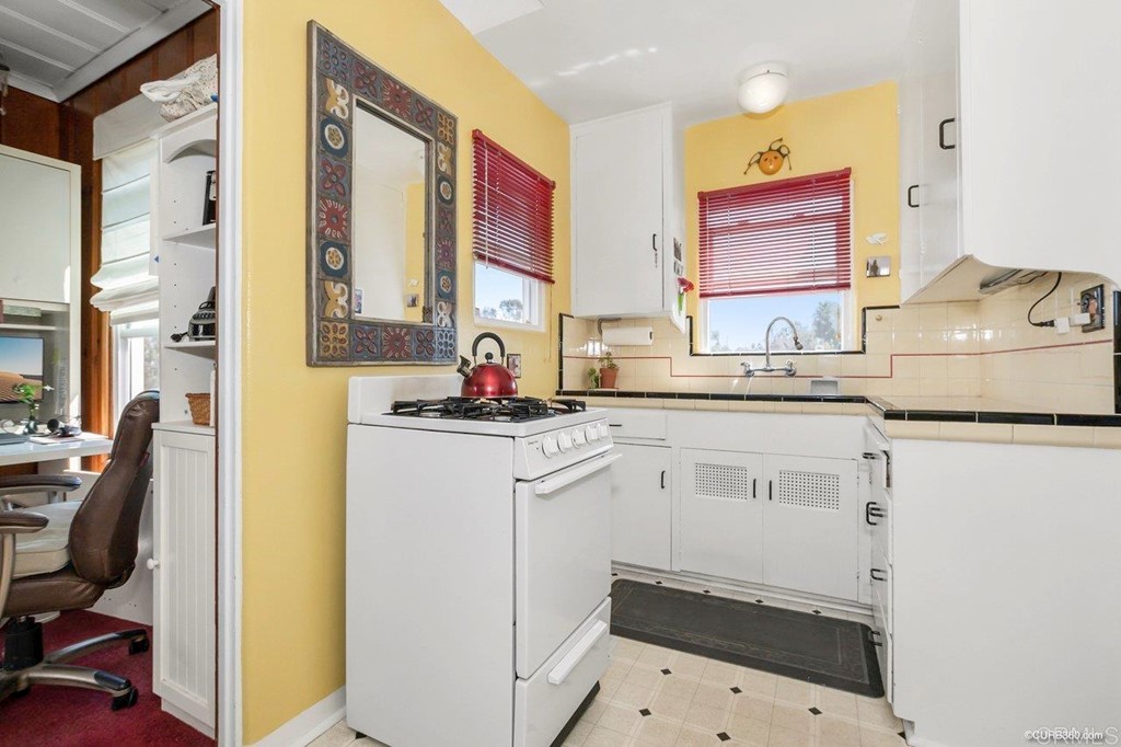 3023-3027 Olive Street San Diego, CA 92104 - Photo 9 of 41 Bright and cheery vintage kitchen overlooking Switzer Canyon