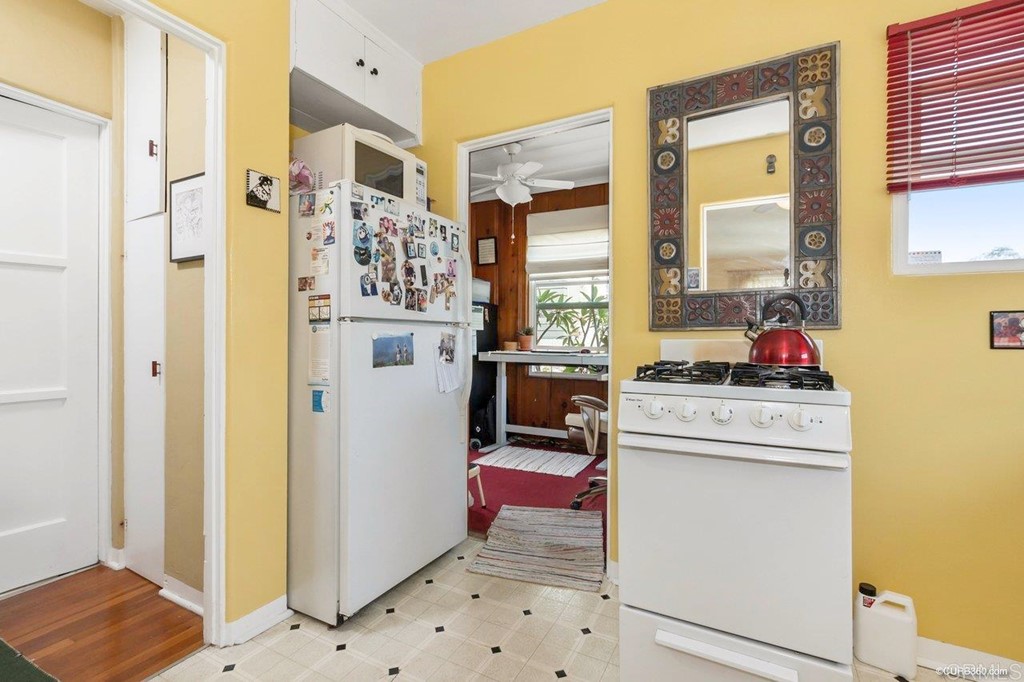3023-3027 Olive Street San Diego, CA 92104 - Photo 10 of 41 Bright and cheery vintage kitchen overlooking Switzer Canyon