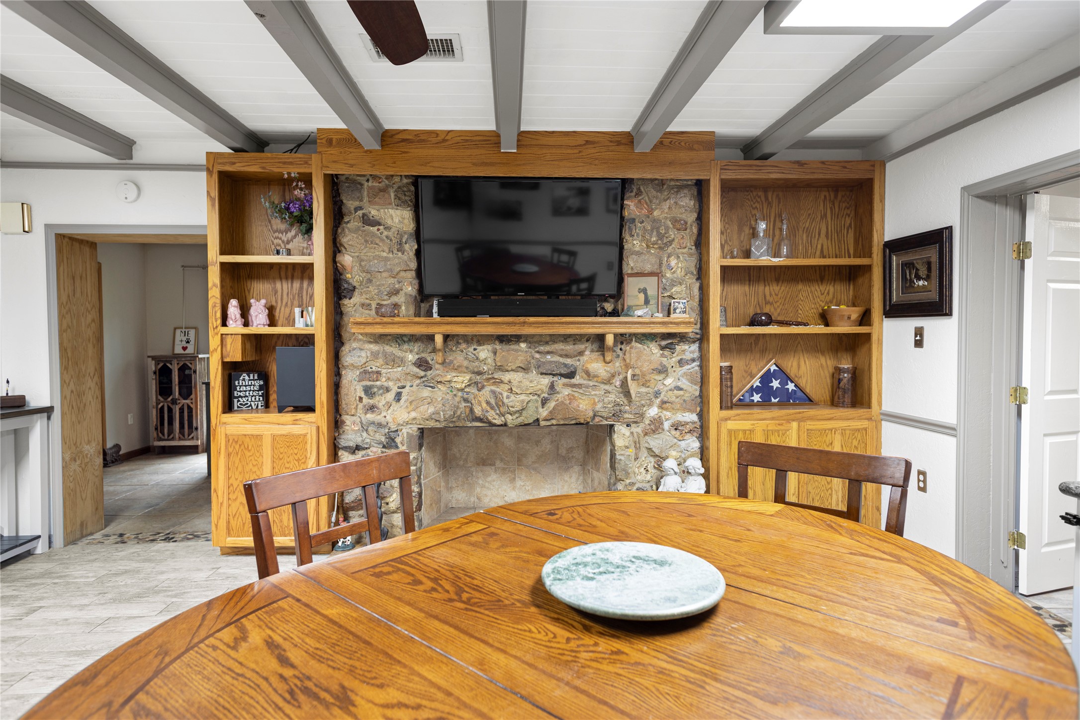 879 Interstate 45 Huntsville, TX 77340 - Photo 11 of 47 a bed room with a bed and a television