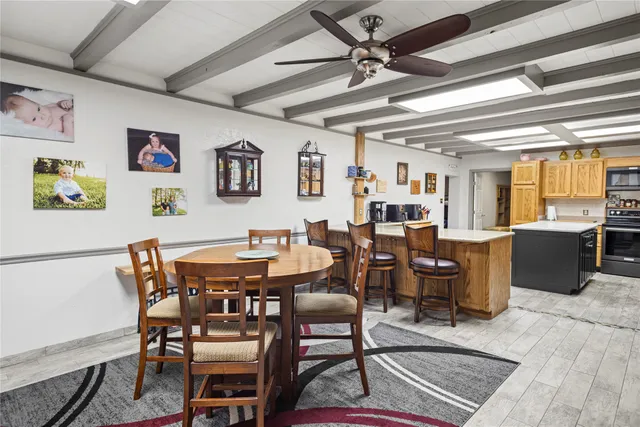 a view of a dining room with furniture