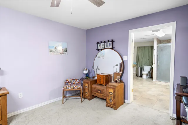 a room with furniture and a mirror