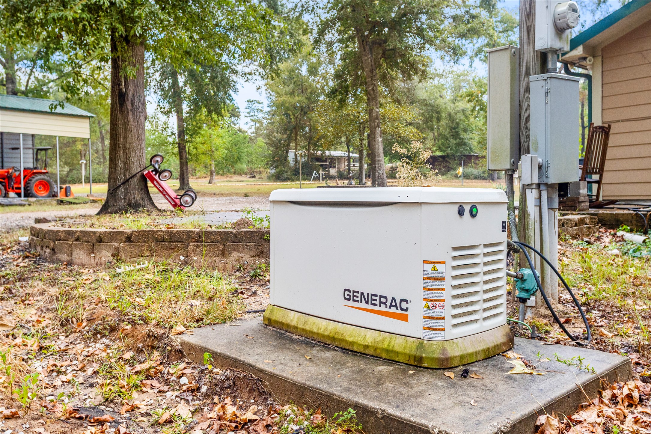 879 Interstate 45 Huntsville, TX 77340 - Photo 32 of 47 a view of a house with backyard and trees