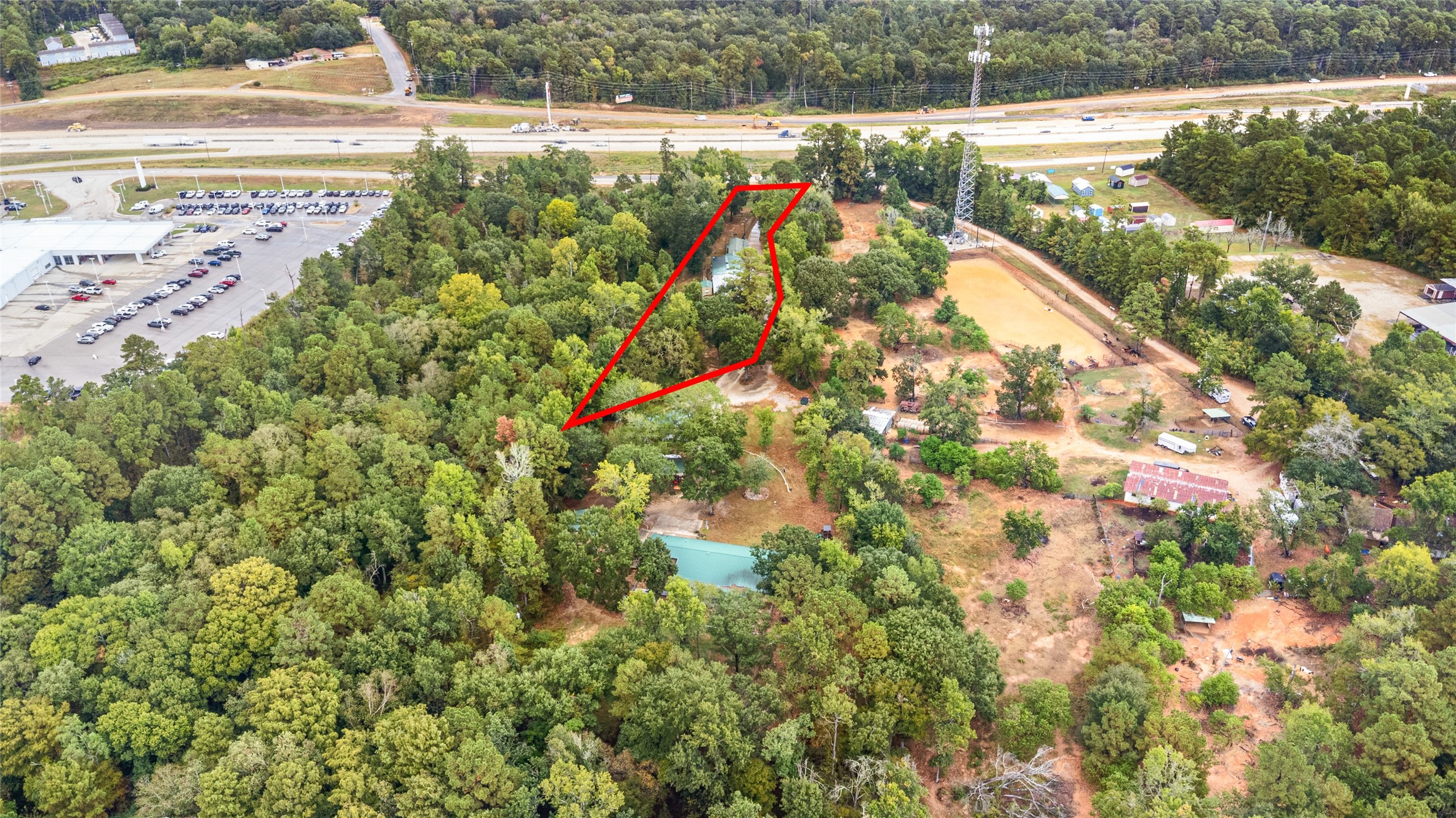 879 Interstate 45 Huntsville, TX 77340 - Photo 47 of 48 a view of a lake with a yard