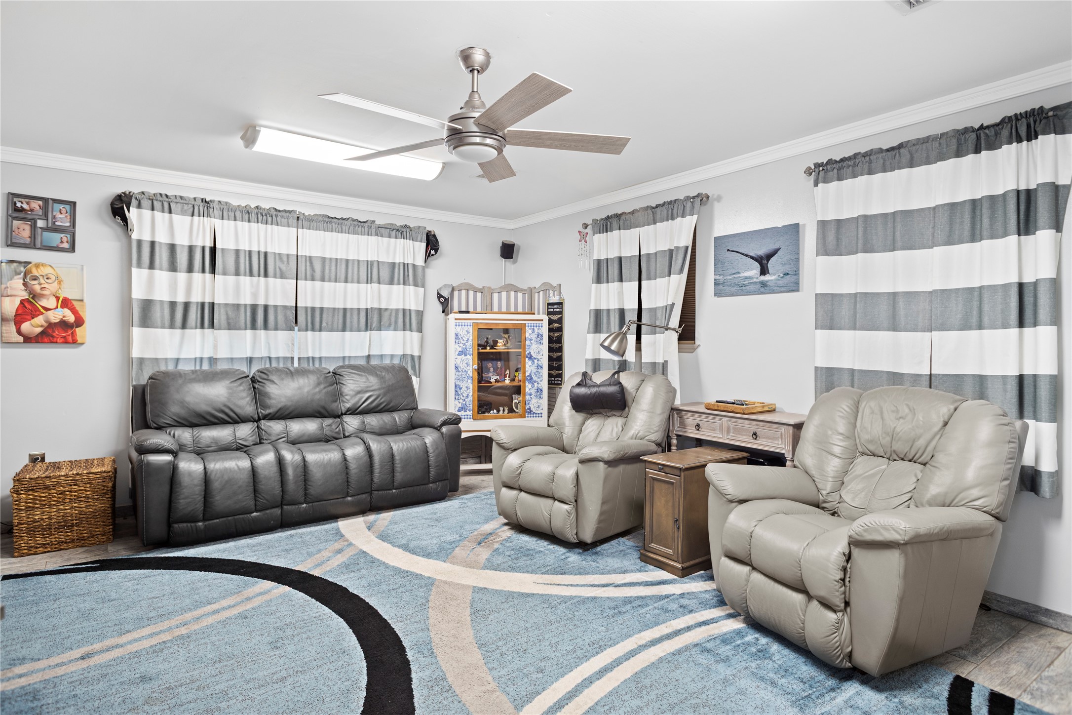 879 Interstate 45 Huntsville, TX 77340 - Photo 8 of 48 a living room with furniture and a large window