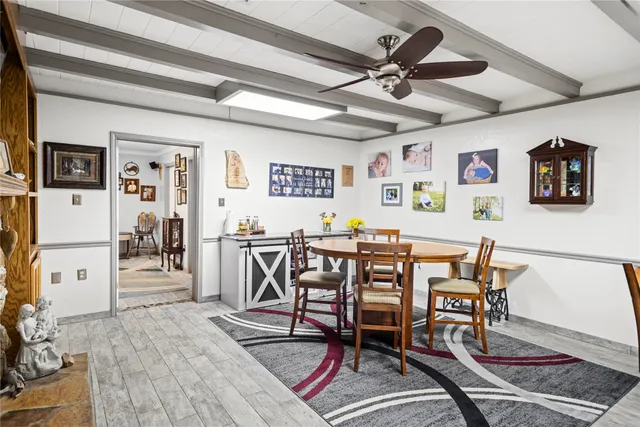 a view of a dining room with furniture
