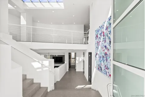a view of entryway with furniture and entryway